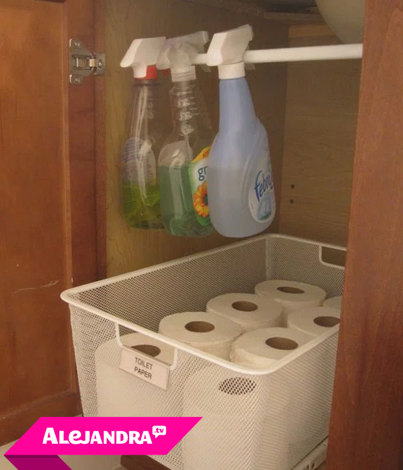 Bathroom Organization Tip: Use a tension rod to store cleaning supplies under the sink. #Alejandratv