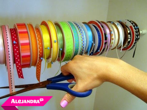 Craft Room Organizing Tip: Use a tension rod in your closet as a DIY ribbon organizer #AlejandraTV