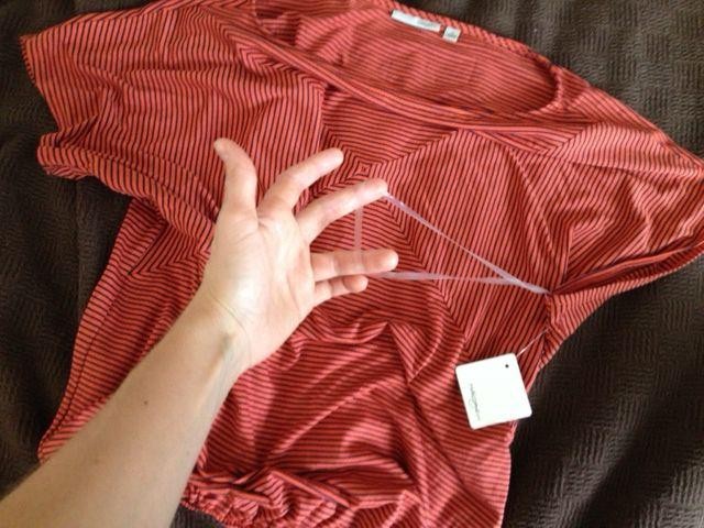 The Annoying Clear Elastic Straps Built Into Shirts