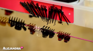 Makeup Organizing Tip: Use bungee cord & magnets to keep hair accessories organized