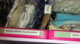 Cheap Organizing Tip: Use free display boxes to organize your linen closet