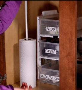 Use a Tension Rod to Keep Your Paper Towels Where you Need Them