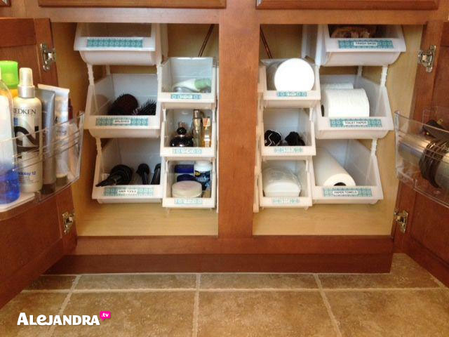 under sink roll outs maximize your cabinet space. www.helpyourshelves.com   Under sink organization bathroom, Bathroom cabinet organization, Diy  bathroom